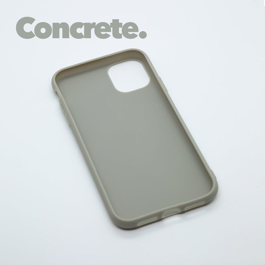 iPhone 11 PRO Concrete case with a matte finish, designed with precise cutouts for easy access to buttons and ports.