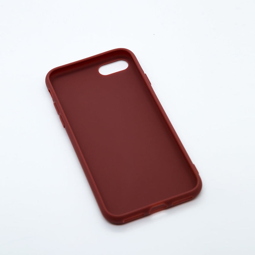 Maroon iPhone 6 case with a matte finish, designed with precise cutouts for easy access to buttons and ports.