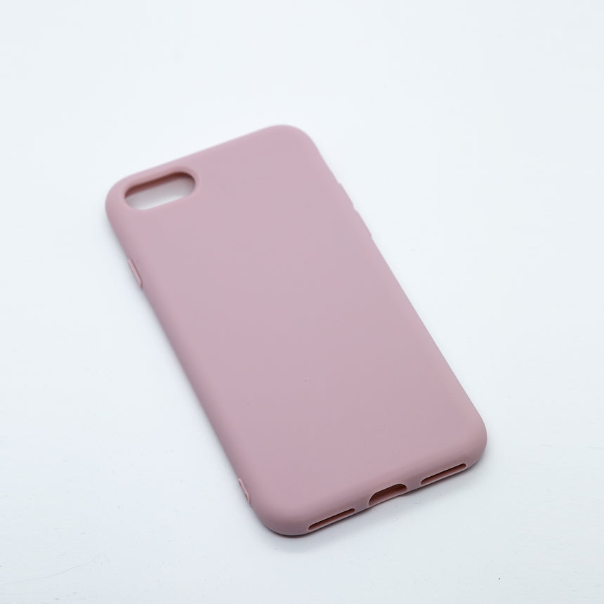 iPhone SE (2020) Blush case with a matte finish, designed with precise cutouts for easy access to buttons and ports.
